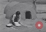 Image of Pueblo Native American Indian food preparation United States USA, 1920, second 39 stock footage video 65675075281