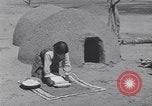 Image of Pueblo Native American Indian food preparation United States USA, 1920, second 40 stock footage video 65675075281