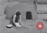 Image of Pueblo Native American Indian food preparation United States USA, 1920, second 41 stock footage video 65675075281