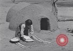 Image of Pueblo Native American Indian food preparation United States USA, 1920, second 42 stock footage video 65675075281