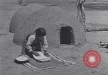 Image of Pueblo Native American Indian food preparation United States USA, 1920, second 44 stock footage video 65675075281