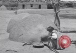 Image of Pueblo Native American Indian food preparation United States USA, 1920, second 49 stock footage video 65675075281