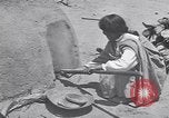 Image of Pueblo Native American Indian food preparation United States USA, 1920, second 52 stock footage video 65675075281