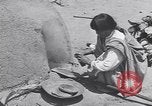 Image of Pueblo Native American Indian food preparation United States USA, 1920, second 55 stock footage video 65675075281