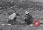 Image of archaeologists at Native American Indian Pueblo site Utah United States USA, 1937, second 22 stock footage video 65675075287