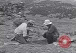 Image of archaeologists at Native American Indian Pueblo site Utah United States USA, 1937, second 25 stock footage video 65675075287