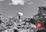 Image of archaeologists at Native American Indian Pueblo site Utah United States USA, 1937, second 38 stock footage video 65675075287