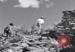 Image of archaeologists at Native American Indian Pueblo site Utah United States USA, 1937, second 39 stock footage video 65675075287
