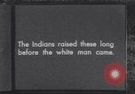 Immagine di Native American Indian bambini mangiare anguria United States USA, 1933, secondo 1 filmato di repertorio 65675075293