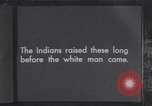 Immagine di Native American Indian bambini mangiare anguria United States USA, 1933, secondo 3 filmato di repertorio 65675075293