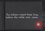 Immagine di Native American Indian bambini mangiare anguria United States USA, 1933, secondo 4 filmato di repertorio 65675075293