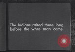 Immagine di Native American Indian bambini mangiare anguria United States USA, 1933, secondo 5 filmato di repertorio 65675075293