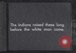 Immagine di Native American Indian bambini mangiare anguria United States USA, 1933, secondo 7 filmato di repertorio 65675075293