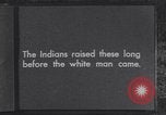 Immagine di Native American Indian bambini mangiare anguria United States USA, 1933, secondo 8 filmato di repertorio 65675075293