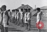 Immagine di Native American Indian boarding shcool studenti play sports Minnesota United States USA, 1933, secondo 59 filmato di repertorio 65675075299