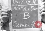 Image of 801st Medical Air Evacuation Squadron caring for wounded Solomon Islands, 1943, second 1 stock footage video 65675075326