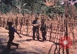 Image vietnamiens de la défense civile hommes Buen Eane Vietnam, 1962, de la seconde 7 séquences d'archives historiques vidéo 65675075337