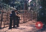 Image vietnamiens de la défense civile hommes Buen Eane Vietnam, 1962, de la seconde 16 séquences d'archives historiques vidéo 65675075337
