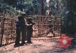Image vietnamiens de la défense civile hommes Buen Eane Vietnam, 1962, de la seconde 21 séquences d'archives historiques vidéo 65675075337