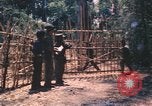 Image vietnamiens de la défense civile hommes Buen Eane Vietnam, 1962, de la seconde 23 séquences d'archives historiques vidéo 65675075337