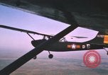 Image of O-1 Bird Dog aircraft Vietnam, 1962, second 6 stock footage video 65675075347