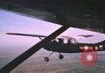 Image of O-1 Bird Dog aircraft Vietnam, 1962, second 9 stock footage video 65675075347