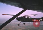 Image of O-1 Bird Dog aircraft Vietnam, 1962, second 11 stock footage video 65675075347