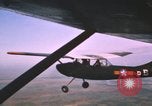 Image of O-1 Bird Dog aircraft Vietnam, 1962, second 12 stock footage video 65675075347
