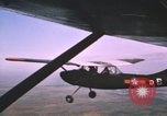 Image of O-1 Bird Dog aircraft Vietnam, 1962, second 13 stock footage video 65675075347
