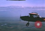Image of O-1 Bird Dog aircraft Vietnam, 1962, second 19 stock footage video 65675075347