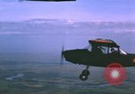 Image of O-1 Bird Dog aircraft Vietnam, 1962, second 20 stock footage video 65675075347