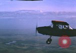 Image of O-1 Bird Dog aircraft Vietnam, 1962, second 21 stock footage video 65675075347