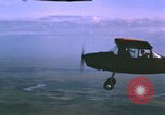 Image of O-1 Bird Dog aircraft Vietnam, 1962, second 23 stock footage video 65675075347