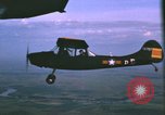 Image of O-1 Bird Dog aircraft Vietnam, 1962, second 32 stock footage video 65675075347