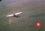 Image of O-1 Bird Dog aircraft Vietnam, 1962, second 35 stock footage video 65675075347