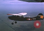 Image of O-1 Bird Dog aircraft Vietnam, 1962, second 52 stock footage video 65675075347
