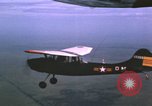 Image of O-1 Bird Dog aircraft Vietnam, 1962, second 53 stock footage video 65675075347
