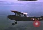 Image of O-1 Bird Dog aircraft Vietnam, 1962, second 57 stock footage video 65675075347