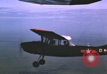 Image of O-1 Bird Dog aircraft Vietnam, 1962, second 58 stock footage video 65675075347