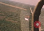 Image of aerial views of napalm bomb explosions in Vietnam War Vietnam, 1962, second 4 stock footage video 65675075352