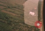 Image of aerial views of napalm bomb explosions in Vietnam War Vietnam, 1962, second 6 stock footage video 65675075352