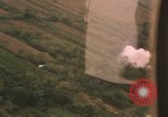Image of aerial views of napalm bomb explosions in Vietnam War Vietnam, 1962, second 8 stock footage video 65675075352