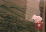 Image of aerial views of napalm bomb explosions in Vietnam War Vietnam, 1962, second 9 stock footage video 65675075352