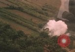 Image of aerial views of napalm bomb explosions in Vietnam War Vietnam, 1962, second 10 stock footage video 65675075352