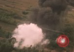 Image of aerial views of napalm bomb explosions in Vietnam War Vietnam, 1962, second 11 stock footage video 65675075352