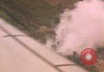 Image of aerial views of napalm bomb explosions in Vietnam War Vietnam, 1962, second 12 stock footage video 65675075352