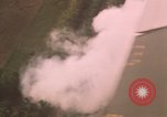 Image of aerial views of napalm bomb explosions in Vietnam War Vietnam, 1962, second 13 stock footage video 65675075352