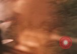 Image of aerial views of napalm bomb explosions in Vietnam War Vietnam, 1962, second 15 stock footage video 65675075352