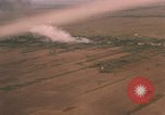Image of aerial views of napalm bomb explosions in Vietnam War Vietnam, 1962, second 20 stock footage video 65675075352