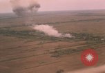 Image of aerial views of napalm bomb explosions in Vietnam War Vietnam, 1962, second 24 stock footage video 65675075352
